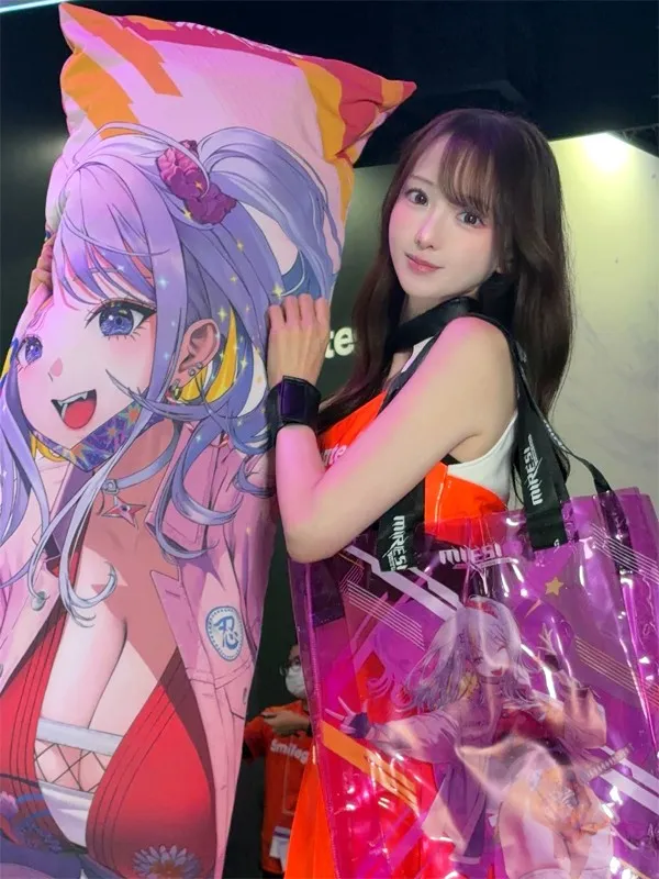 Model Nana poses affectionately with 'Itsuka' character cushion and transparent bag at 'Miraesi: The Unseen Future' promotion zone