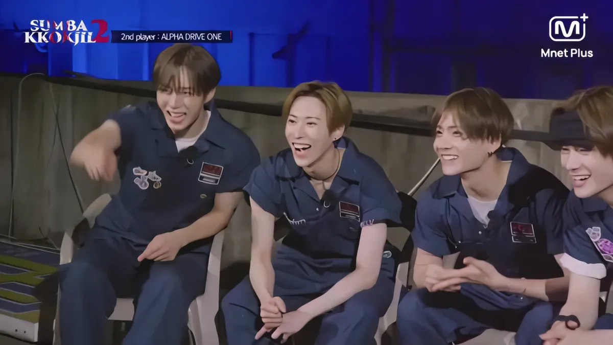 Alpha Drive One's Rio and Members Watch 'Hide and Seek 2: Black Room' Scene in Mnet Plus Official Video