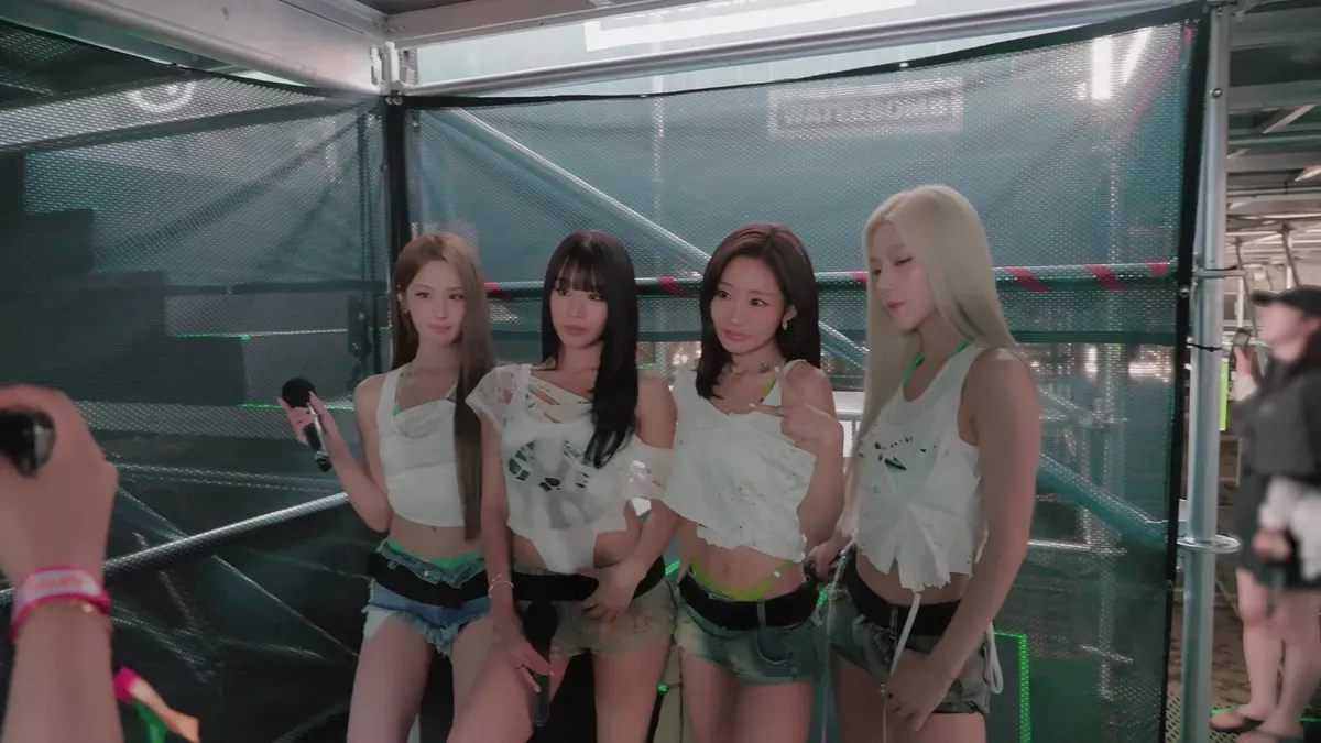 KISS OF LIFE members pose together behind the scenes at WATERBOMB SEOUL 2026
