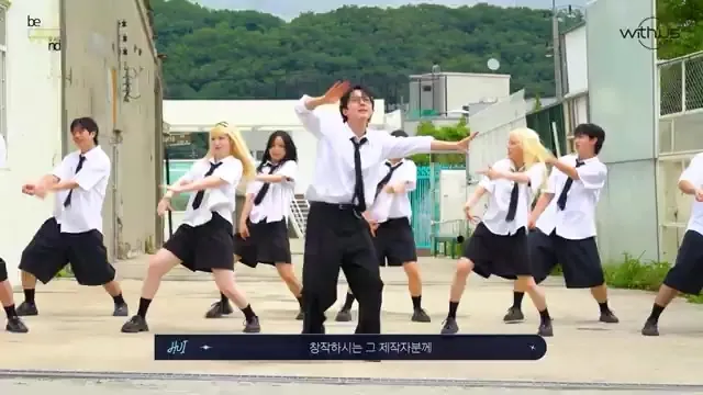 Hui practices choreography on the set of the BINGO music video