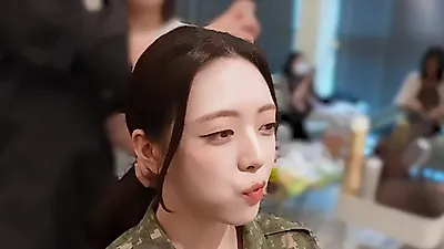 ITZY’s Yuna Shouts ‘Loyalty’ in Military Uniform on Shinhan Nara Sarang Card Ad Set