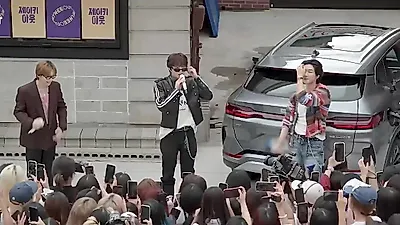 WINNER draws unexpected crowds during surprise guerrilla live in Hongik University area