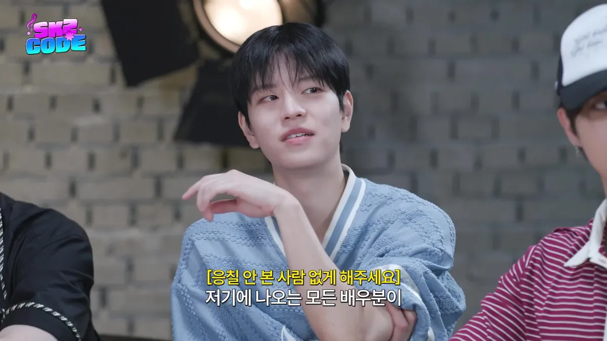 Felix gazes forward while moving his hands