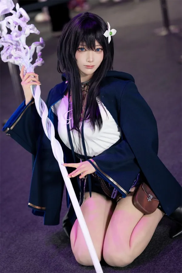 Model Yukimura Poses Seductively with 'Ende's' Large Staff Prop