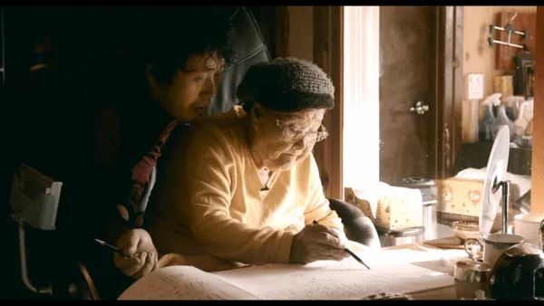 A son follows his mother's breath left behind at Soyosan Mountain: A scene from the film