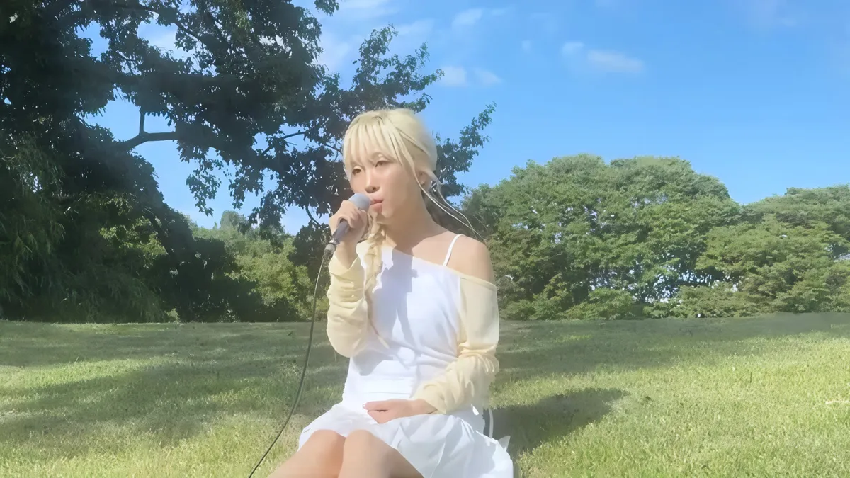 WGAG sings on a lush green lawn in 'Dazzling' music video