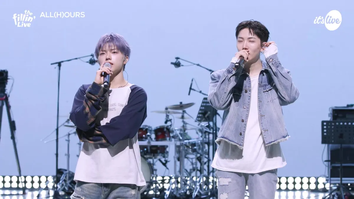 Members of All Hours performing on stage