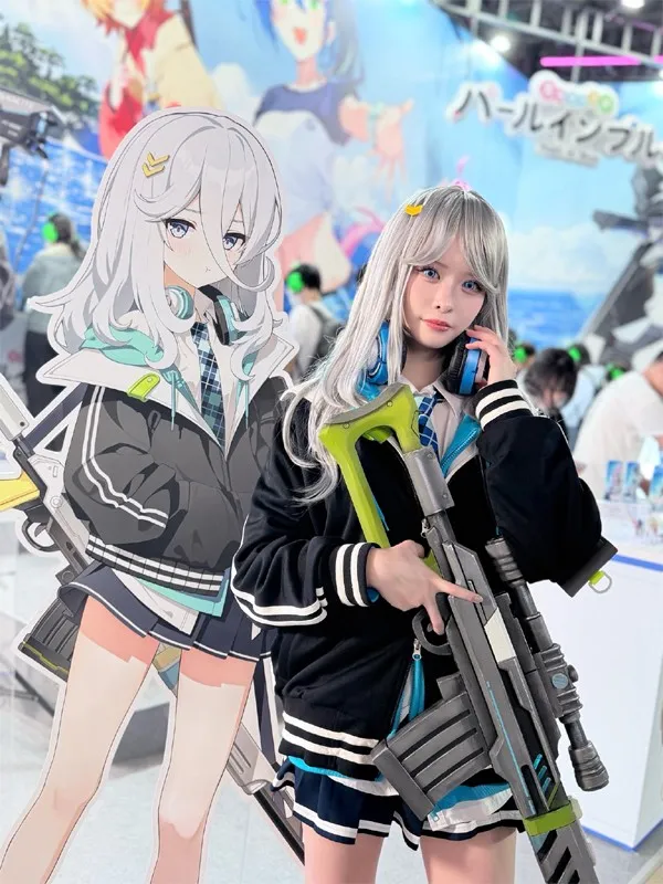 Official Model Shio Yamamoto Poses Coolly with Sniper Rifle Prop Next to Miho Life-size Panel at…