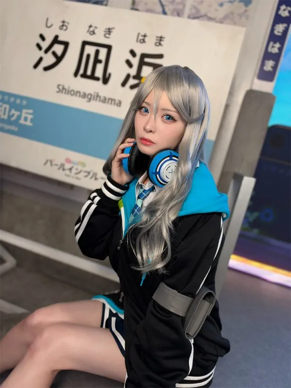 Model Yamamoto Shio gazes into the camera with a mysterious expression while touching her…